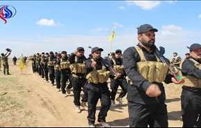 بالصور .. استعراض عسكري للحشد الشعبي غربي الموصل