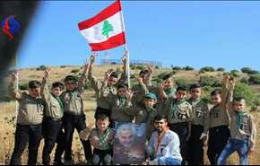 بالصورة.. اشبال كشافة لبنان يحملون صورة سليماني على بعد 300 متر من الصهاينة