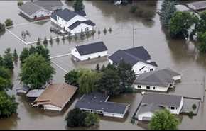 مياه فيضانات تغمر آلاف المنازل في ولاية إيلينوي الأميركية