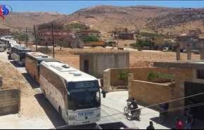 حافلات نقل عناصر داعش تصل الى نقطه التبادل بدير الزور