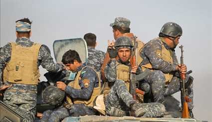 رزمندگان عراقی در میدان نبرد موصل چه می‌کنند؟ (تصاویر)