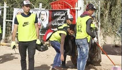 بالصور ..حملات تنظيف واسعة على طريق زوار الامام الحسين ( ع )