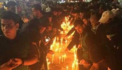 بالصور ...مهرجان الشموع في كربلاء المقدسة تخليدا لشهداء القوات العراقية