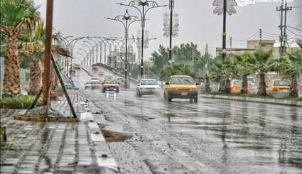 شاهد بالصور أجواء المطر في  محافظة البصرة العراقية..