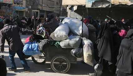 خروج الارهابيين من حلب وصور الرئيس الاسد ترافقهم