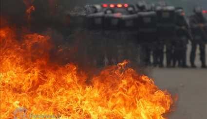 المتظاهرون البرازيليون يضرمون النار في الشوارع