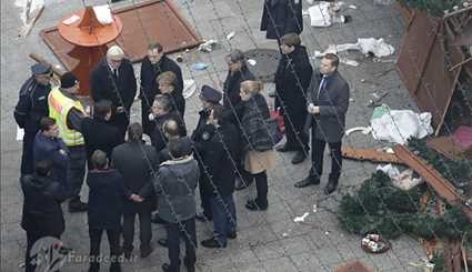 حضورانجيلا ميركل في مكان الحادث الإرهابي في برلين