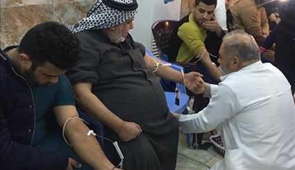 بالصور ..حملة تبرع بالدم لدعم القوات الأمنية والحشد الشعبي العراقي في بغداد