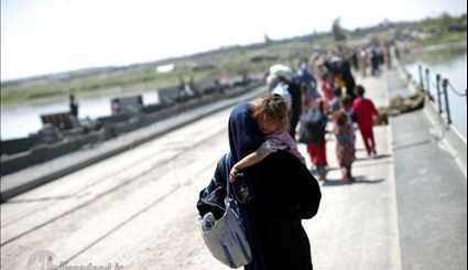 هروب نساء واطفال من داعش