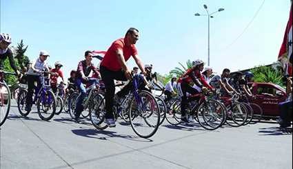 Syrians Take Part in Cycling Marathon to Mark Martyrs' Day in Damascus