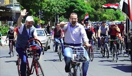 Syrians Take Part in Cycling Marathon to Mark Martyrs' Day in Damascus