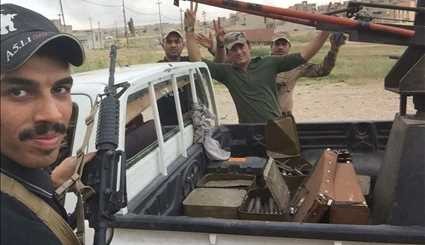 بالصور..القوات العراقية تضبط اسلحة تعود لإرهابيي
