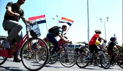 Syrians Take Part in Cycling Marathon to Mark Martyrs' Day in Damascus