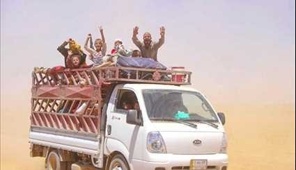القوات الشعبية الإنقاذ المدنيين بالقرب من منطقة الحدود العراقية السورية