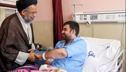 Intelligence minister visiting the injured of Tehran attacks