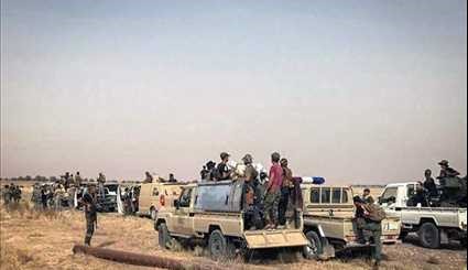 بالصور.. انتشار واسع لحركة النُجَباء في المثلث الحدودي بين العراق وسوريا والاردن