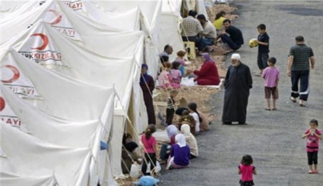 مئات السوريين يعودون من مخيمات تركيا