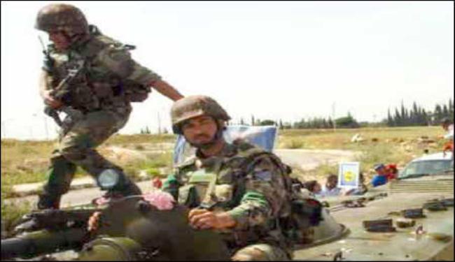 جرحى بمهاجمة مسلحين لحاجز امني بتلكلخ السورية