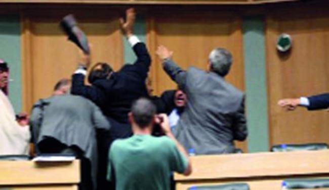 نكات سياسية أردنية: رئيس البرلمان يحظر دخول النواب بأحذيتهم بعد عراك