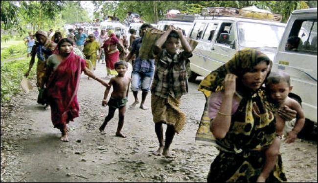 مسلمون يفرون من العنف العرقي الى آسام الهندية 