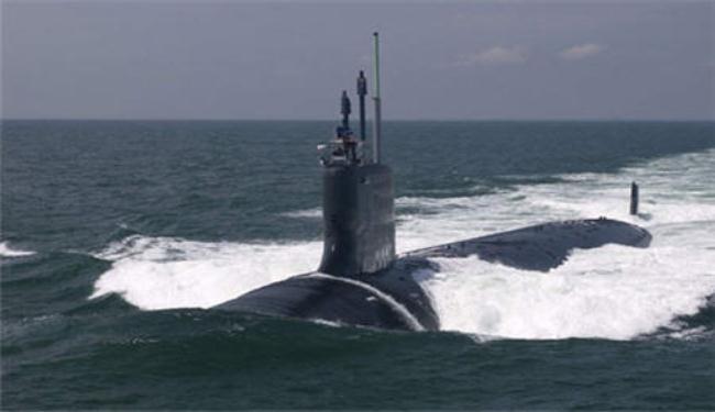 تصادم بين غواصة نووية هجومية وطراد اميركيين