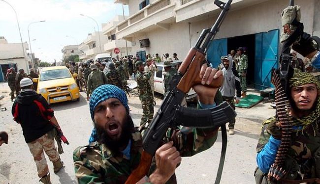 ليبيا: قوة عسكرية لإخلاء مقار المسلحين بطرابلس