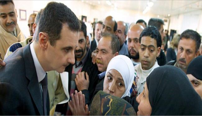 بشار الأسد یزور مركزا تربويا للفنون الجميلة بدمشق
