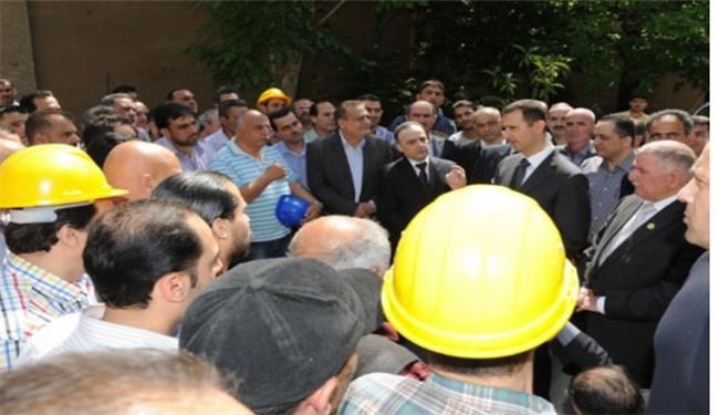 اسد در مراسم بزرگداشت روز کارگر حضور یافت