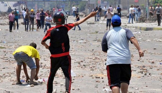 صور اشتباكات بين انصار مرسي وقوات الأمن المصرية