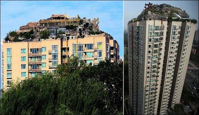 صيني يبني فيلا جبلية على قمة مبنى سكني بالصين