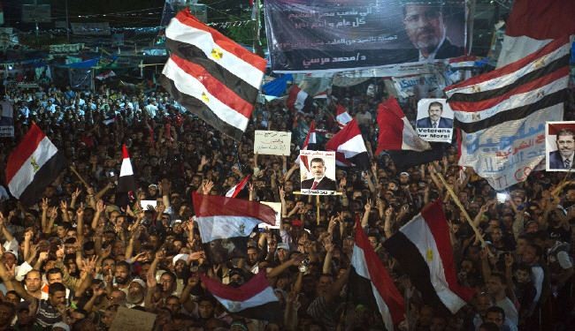 مصر... قتلى وجرحى في اشتباكات بين أنصار مرسي ومعارضيه