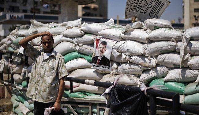 الداخلية المصرية تعلن ضبط اسلحة وذخيرة في ميدان النهضة