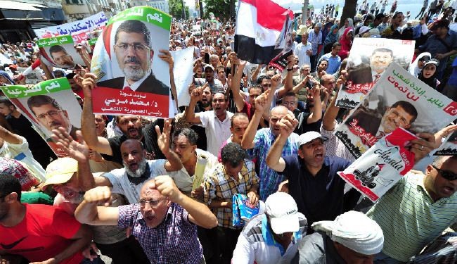 التحالف المؤيد لمرسي يؤكد مواصلته التظاهر