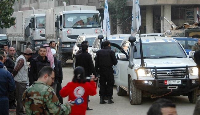 ادخال مساعدات انسانية واصابة 7 من الهلال الاحمر السوري بحمص