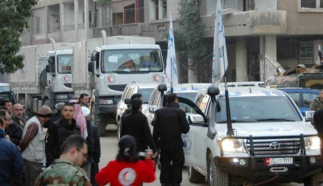 اخراج دفعة جديدة من المدنيين من حمص رغم اطلاق النار