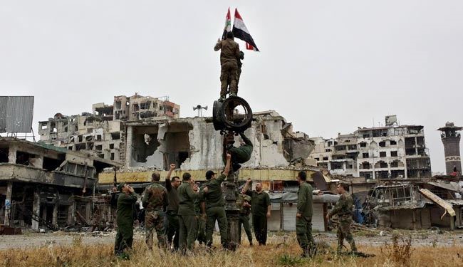 برافراشته شدن پرچم سوریه در حمص قدیم + عکس
