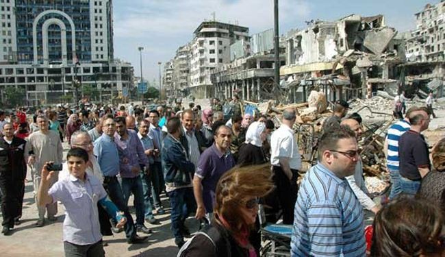 بالصور؛ ابناء حمص يتهافتون عليها.. سنبني ما دمره الارهاب