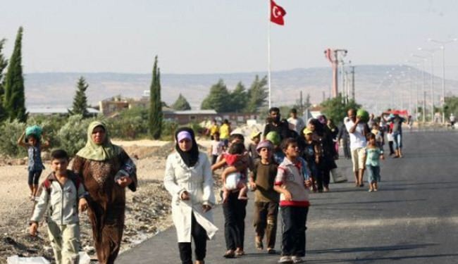 تركيا تطلب مساعدة خارجية لاستقبال اللاجئين السوريين