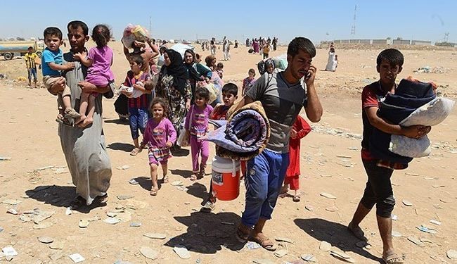 نزوح نحو 1500 تركماني إلى الحدود التركية السورية