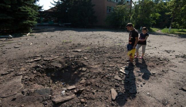 مقتل تلميذين وجرح 3 بسقوط قذيفة في دونيتسك