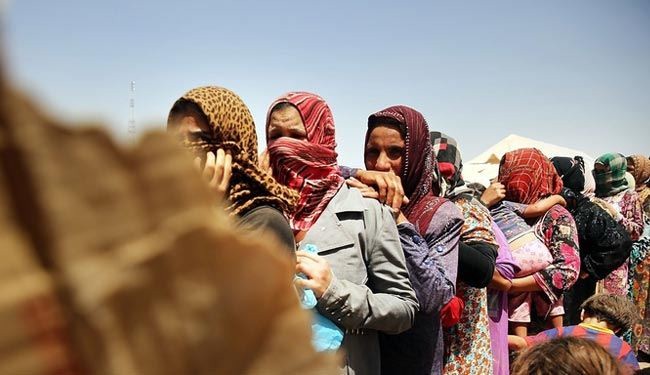 عشرات النساء العراقيات ينظمن تظاهرة للتنديد بانتهاكات 