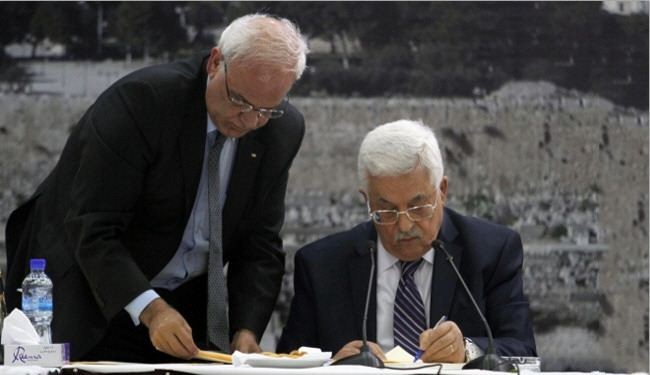 عباس يوقع على الانضمام الى الجنائية الدولية والى 20 اتفاقية دولية
