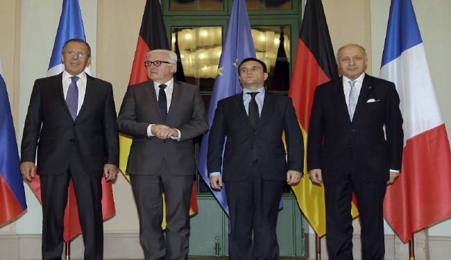 برلين وباريس وموسكو وكييف تدعو الى وقف القتال في اوكرانيا