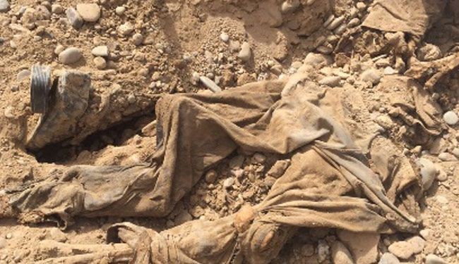 بالصور؛ الكشف عن مقبرة جديدة لضحايا سبايكر مطمورة بالحجر