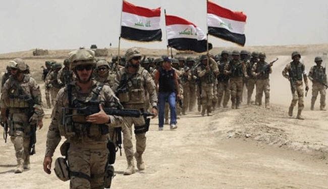 مئات الجنود العراقيين ينتشرون في قاعدة قرب الموصل
