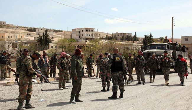 الجيش السوري يتابع تقدمه في تدمر ويسيطر على حي العامرية