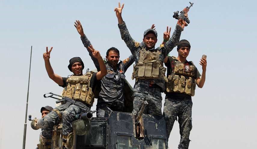 تحرير 6 أحياء في الموصل ورفع العلم العراقي فوق مبانيها
