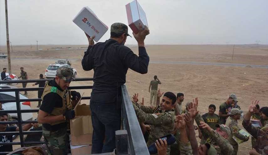 بالصور ..تقديم الدعم اللوجستي للقوات العراقية في قاطع القيارة
