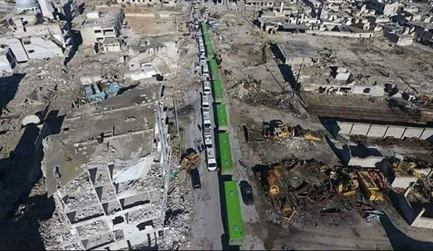 صور لحظة دخول وخروج الباصات لاخراج مسلحي حلب