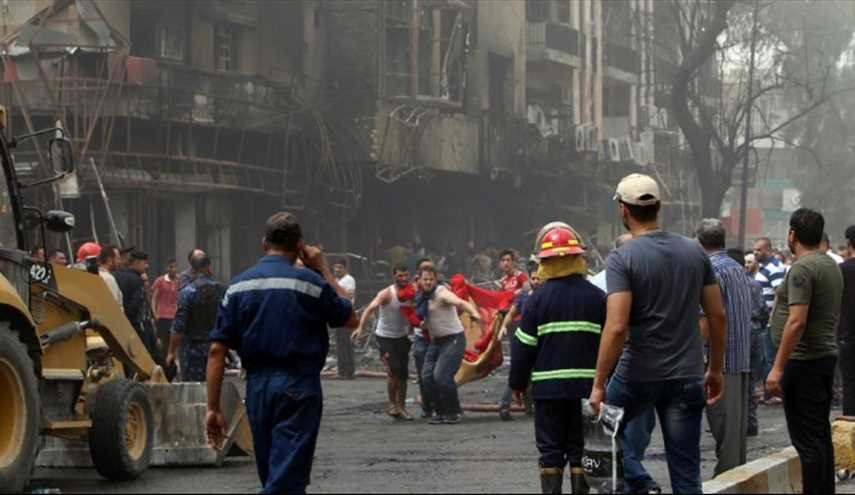 صور لآثار التفجير الإرهابي في مدينة الصدر العراقية